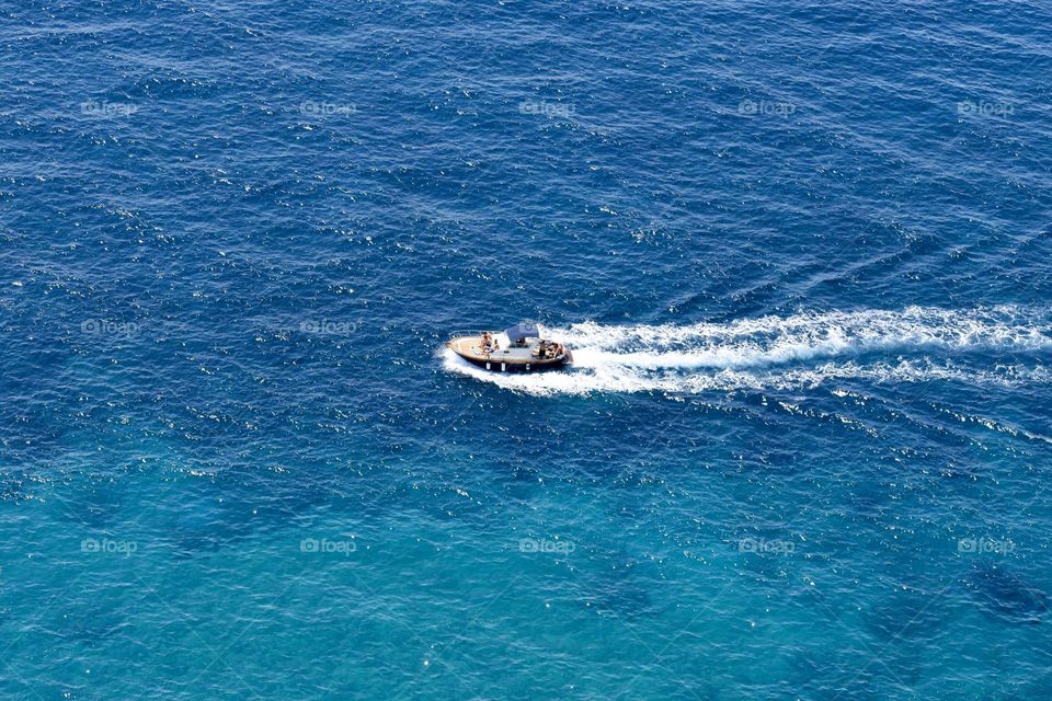 Boat sailing on a calm sea 