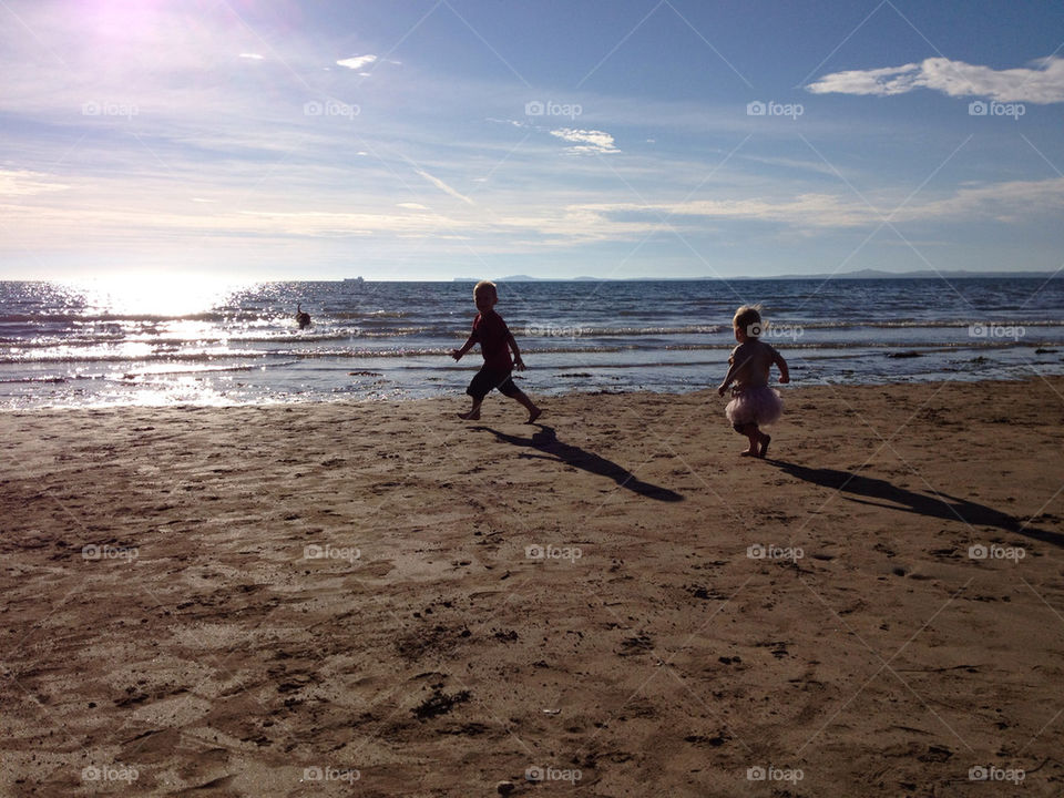beach sky children play by mrdude81