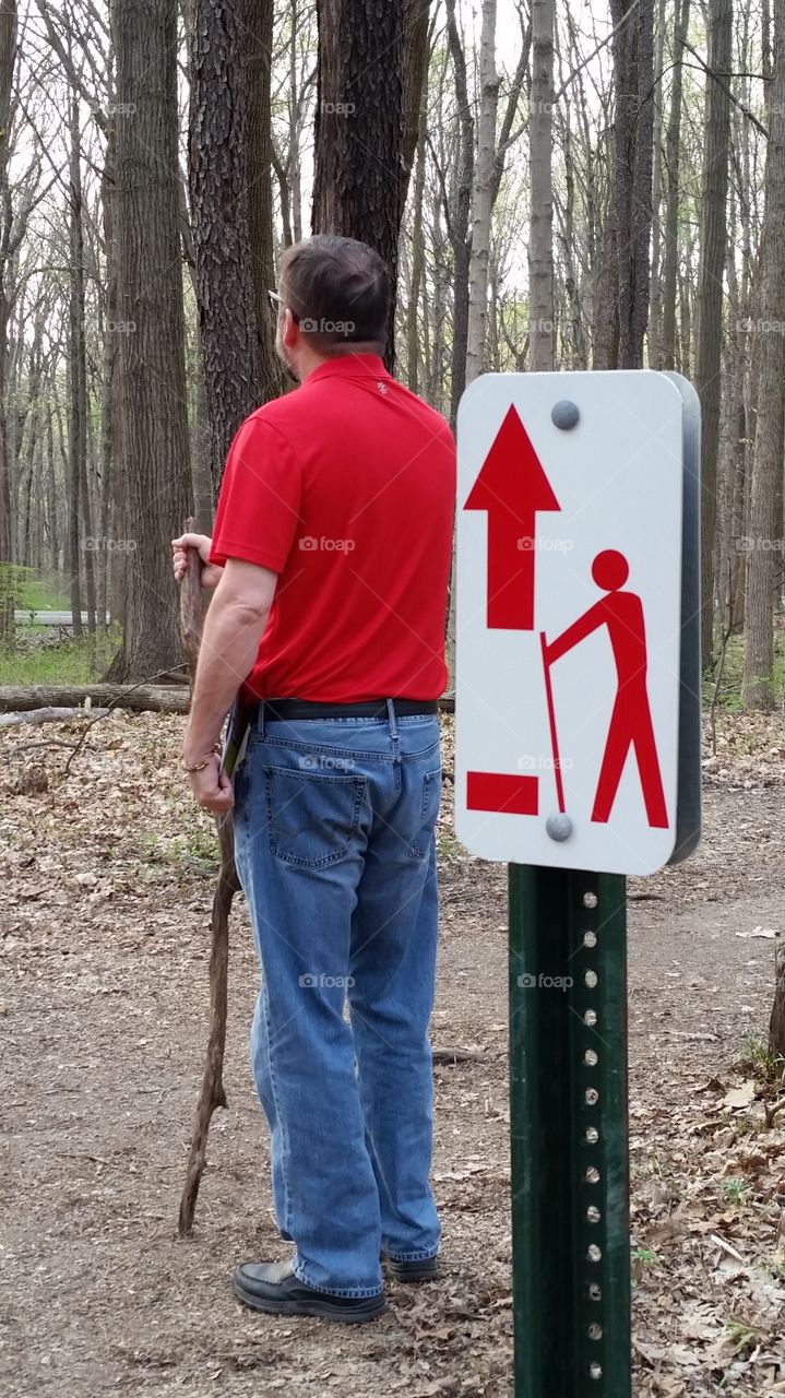 hiking man with hiking sign