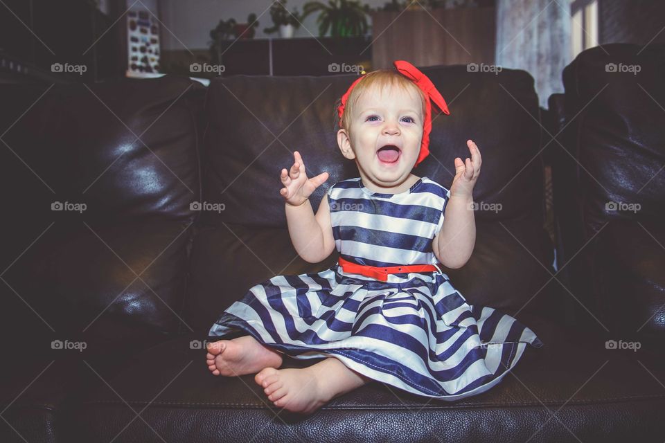 Portrait of happy baby girl