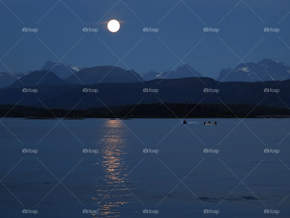 The moon reflected in the water