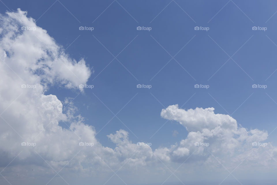 Blue sky with clouds.