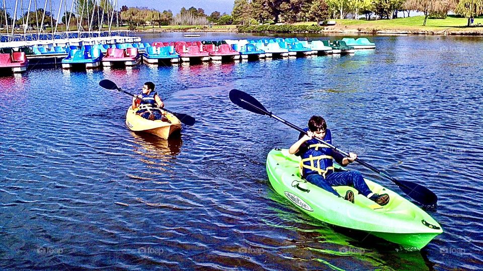 Children canoeing at a California lake