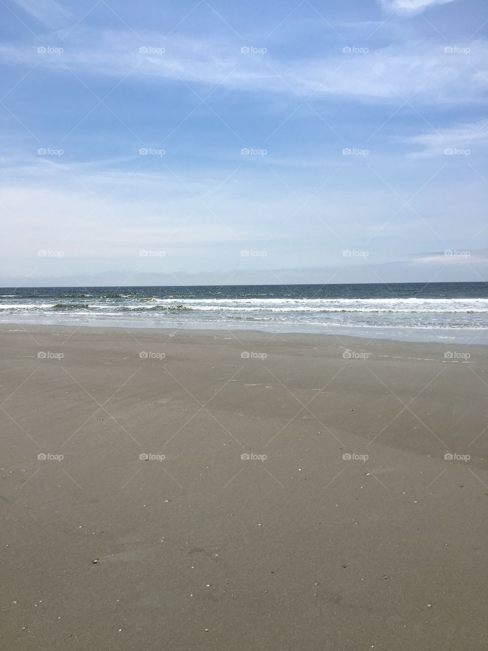The beach in North Carolina on a cloudy day. 