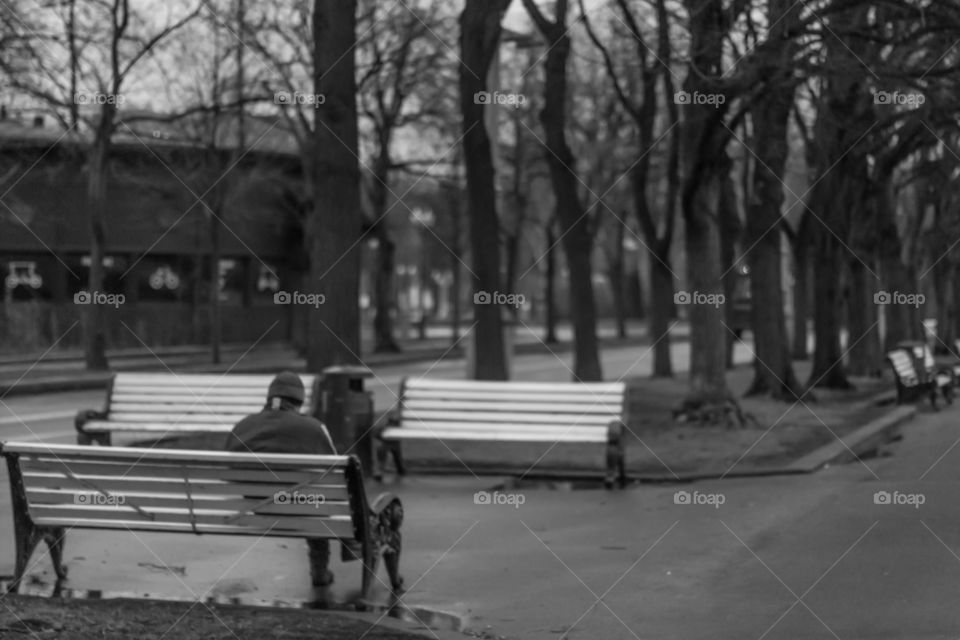 Man alone on the bench . Moscow , Russia 