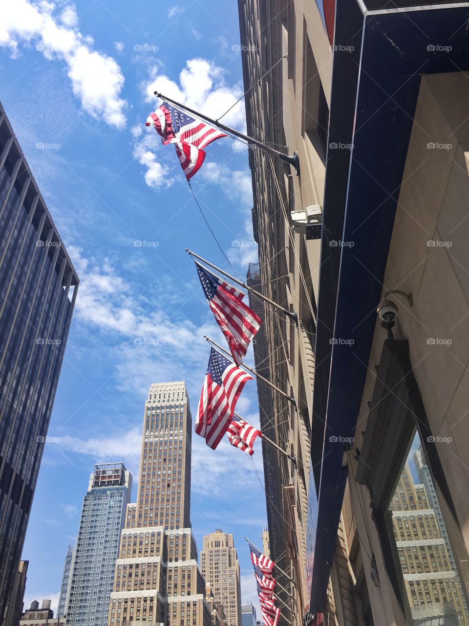 Manhattan . American flags hanging over Manhattan 