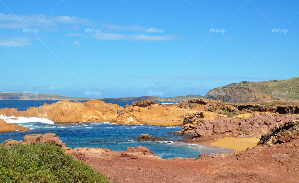 cliffs on the beach of menorca Balearic island in Spain