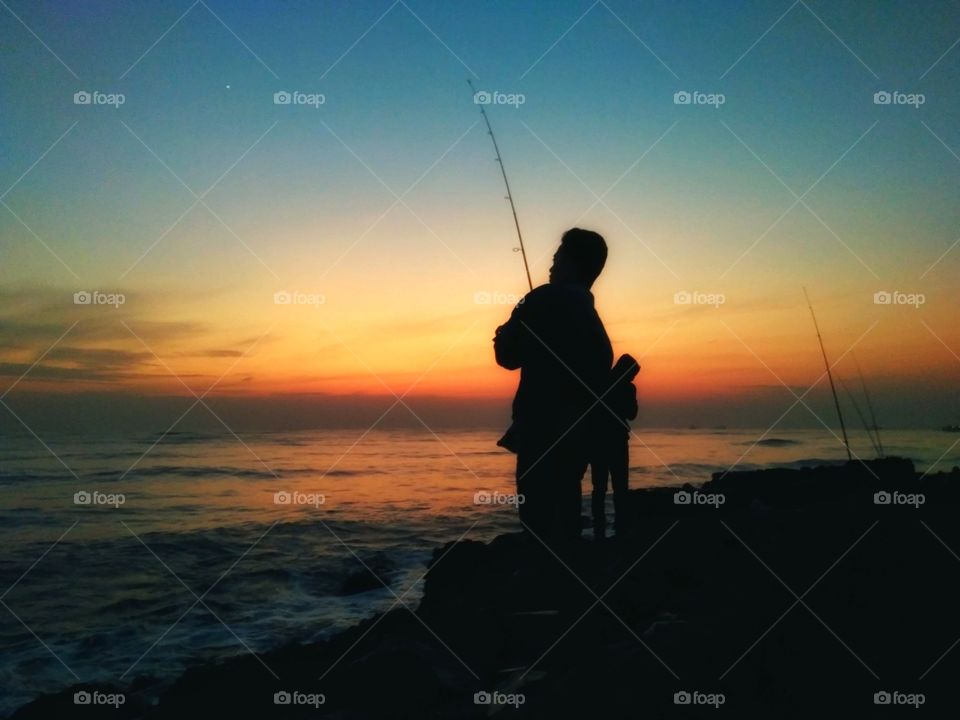 fishing at dusk
