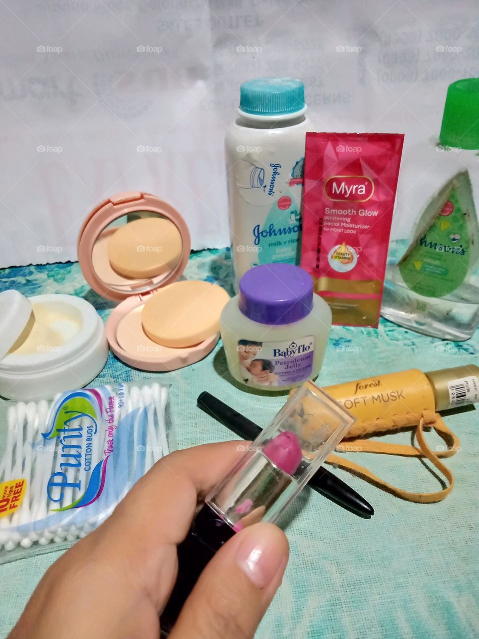 BEAUTY PRODUCT IN YOUR HAND,, LIPSTICK, DAY AND NIGHT CREAM, FACE POWDER, MOISTURIZER, BODY OIL, BODY POWDER, ETC.,