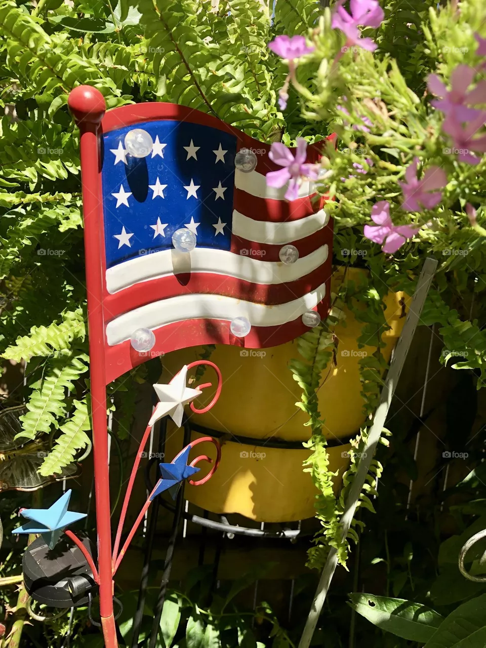 USA Flag and flowers in the garden 🪴