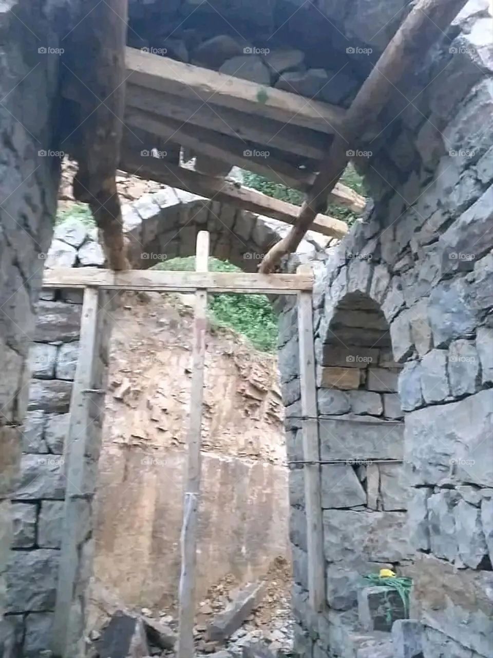 A stunning view of green mountains covered in fog in Yemen