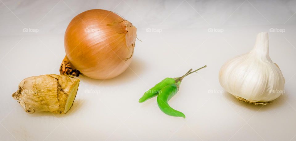 The basic raw materials used daily in Indian cooking