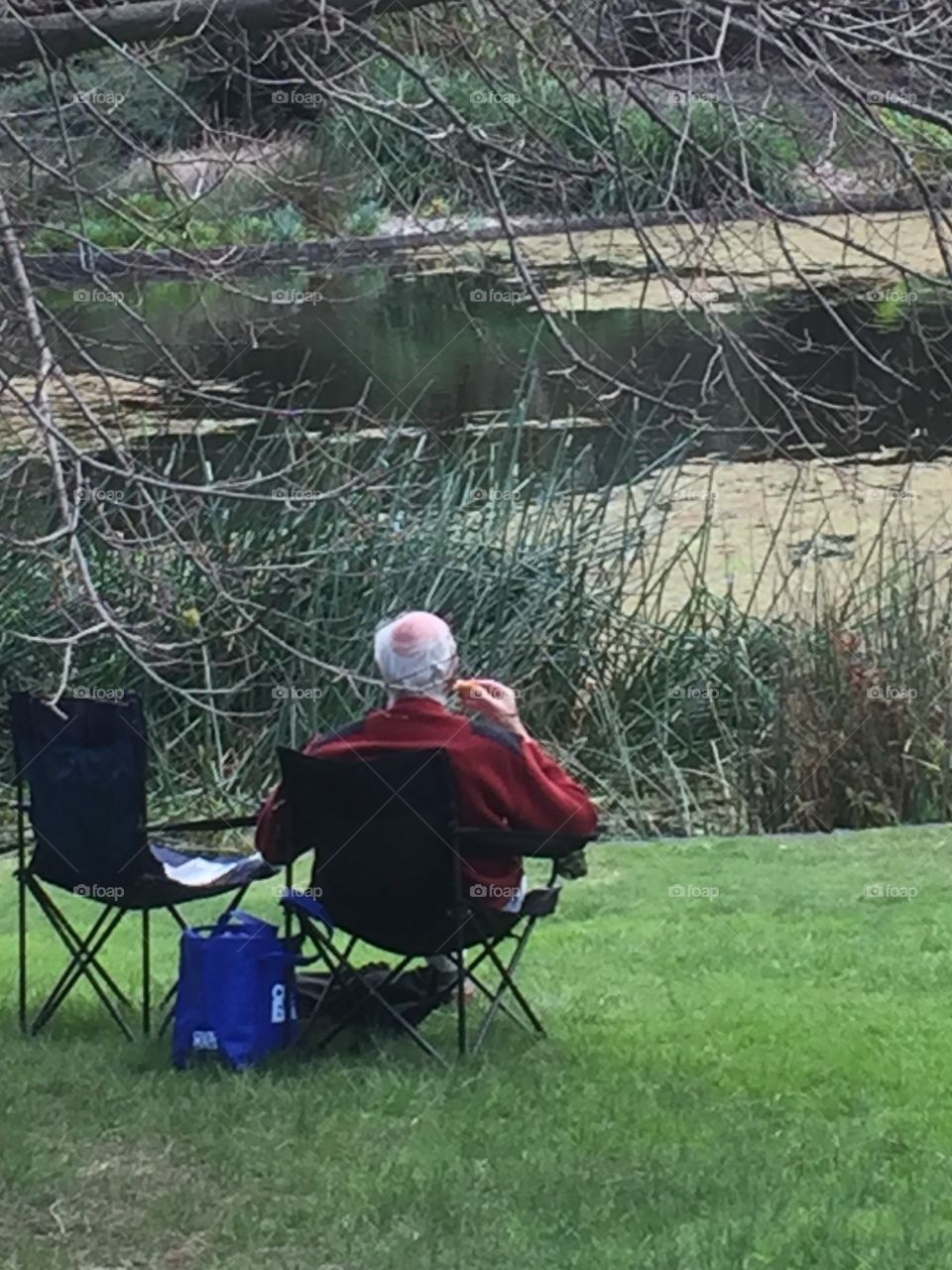 Elderly relaxing in the park