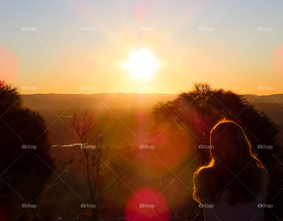 Observing the sunset at the top of a mountain in Australia.