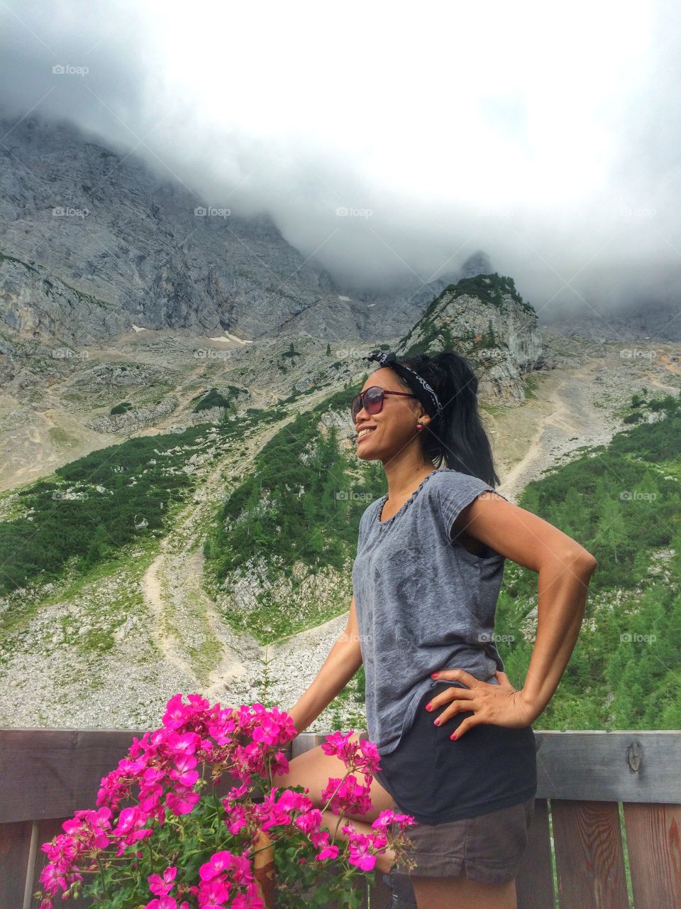 Woman posing in front of mountain