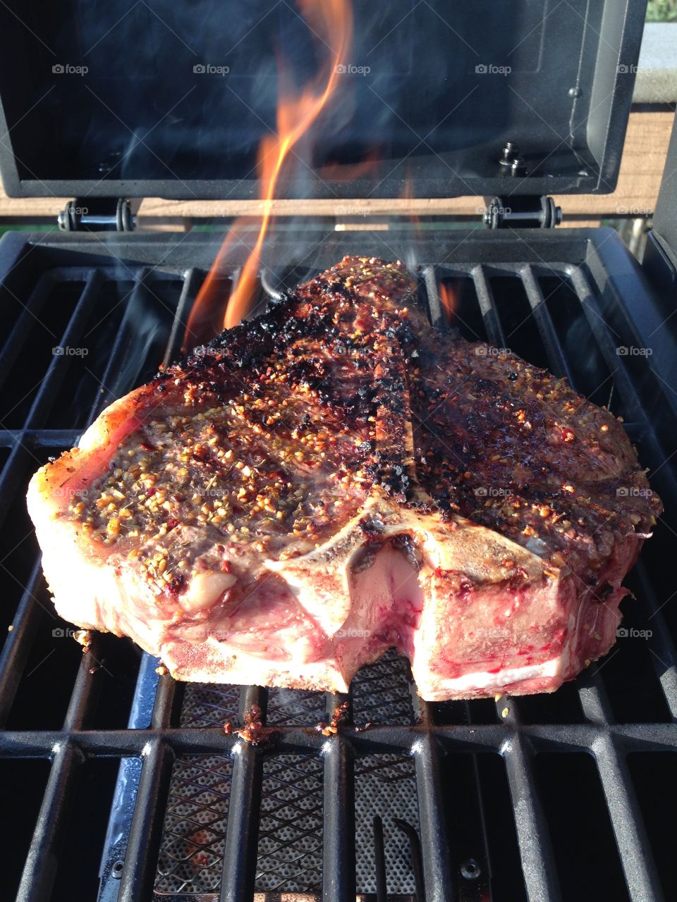 Flaming T-bone steak . Flaming T-bone steak 