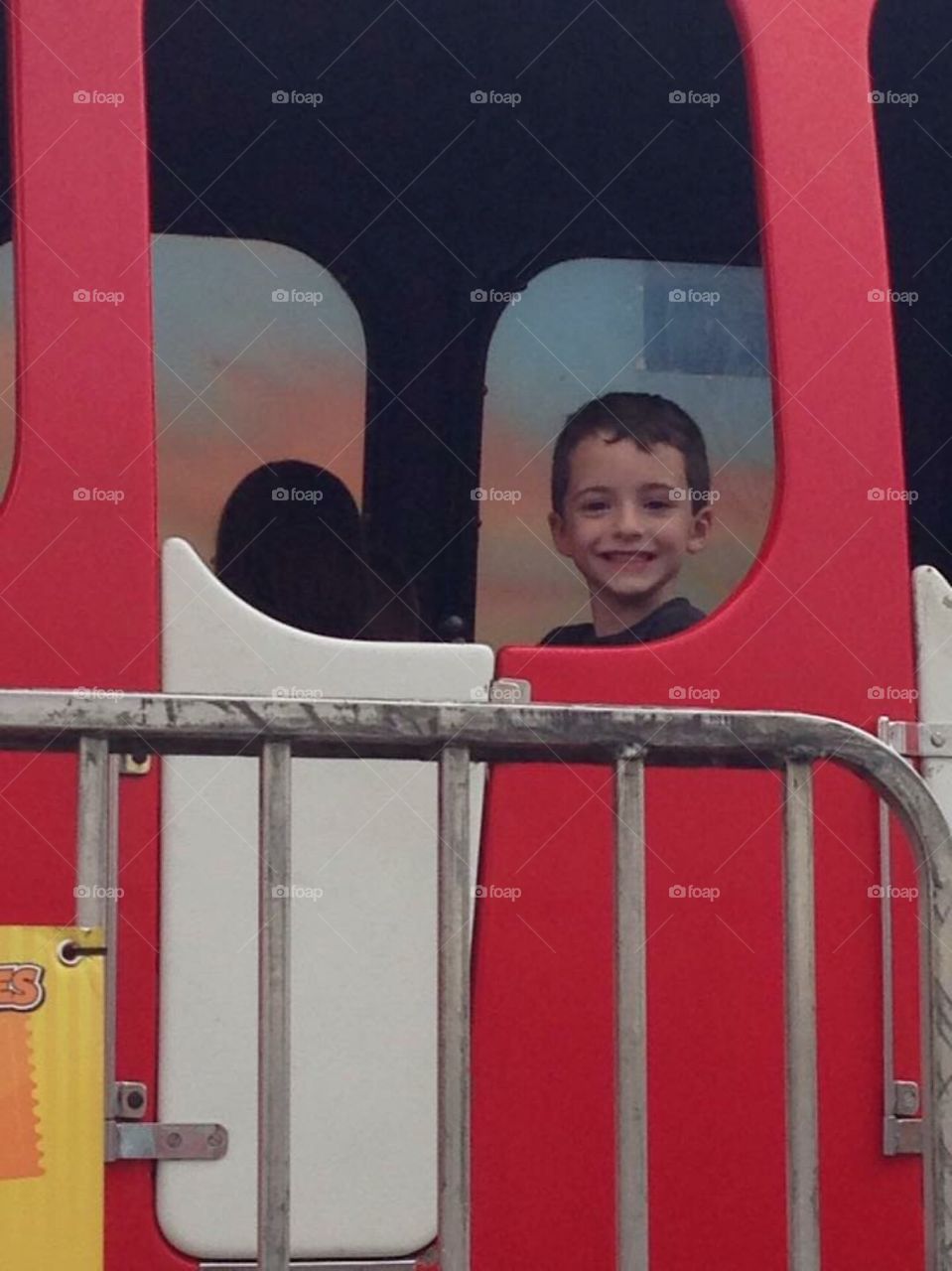 Happy Boy On Playground 