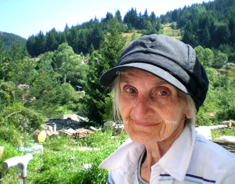 Senior woman portrait, countryside life