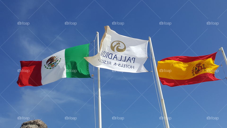 Spanish Mexican and Grand Palladium flags