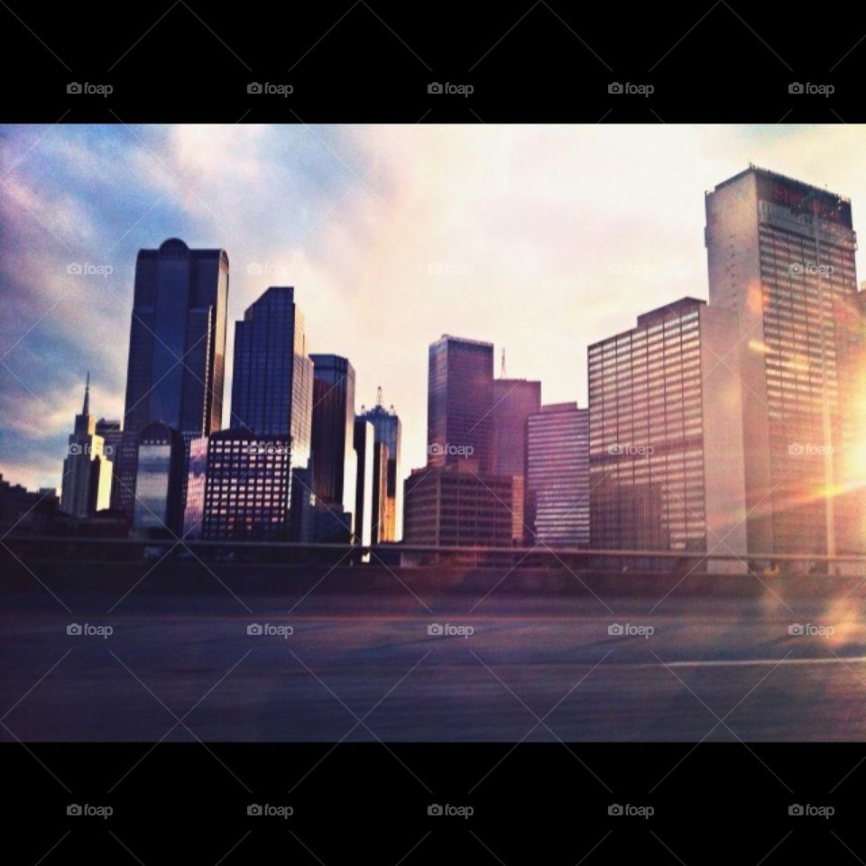 Dallas, Texas in the early morning sun; a city doused in color. (Contact for photo without border. :D)