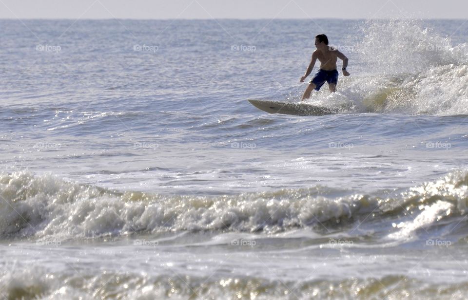 A man surfing 