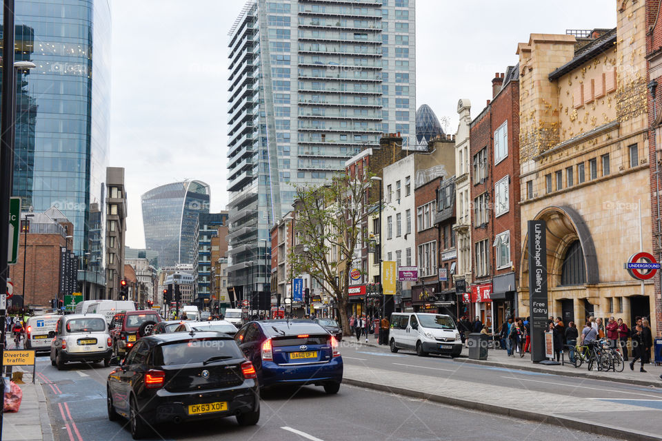 Streets of London in finance area, walkie talkie building in the background.