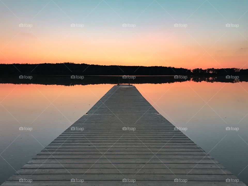 A beautiful warm evening at the lake. I just love the colors from the setting.