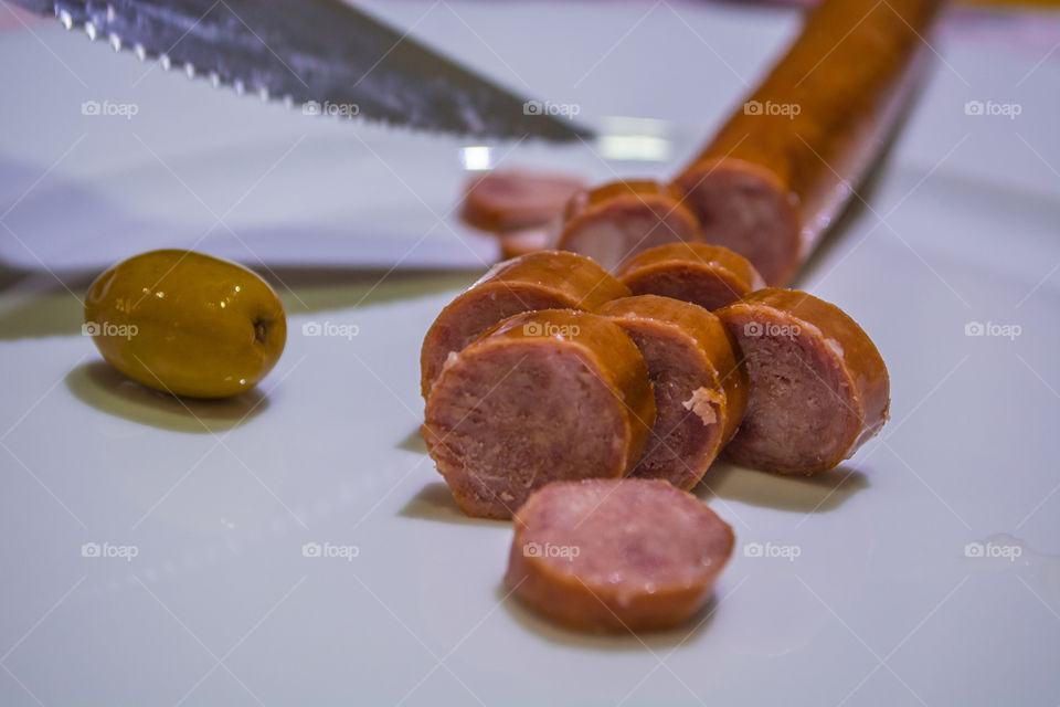 Slicing a sausage