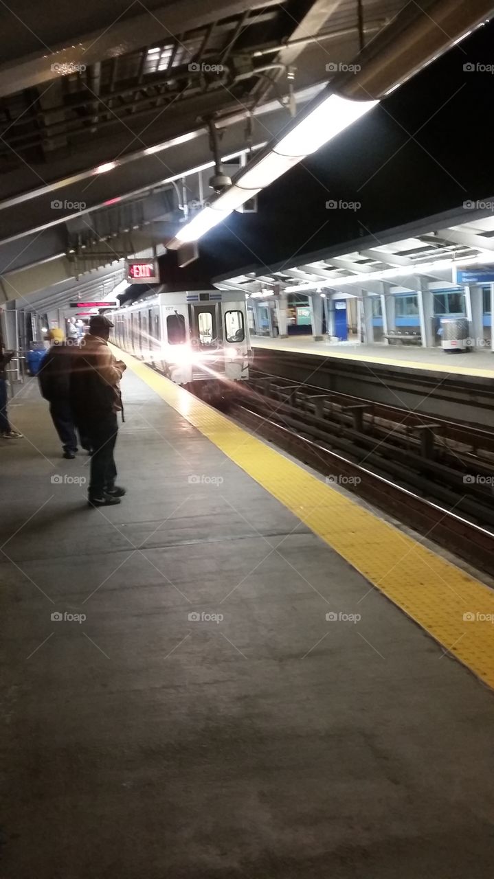Train arrives on subway  platform