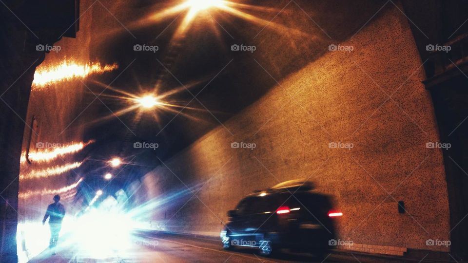 Tunnel at night blurred city