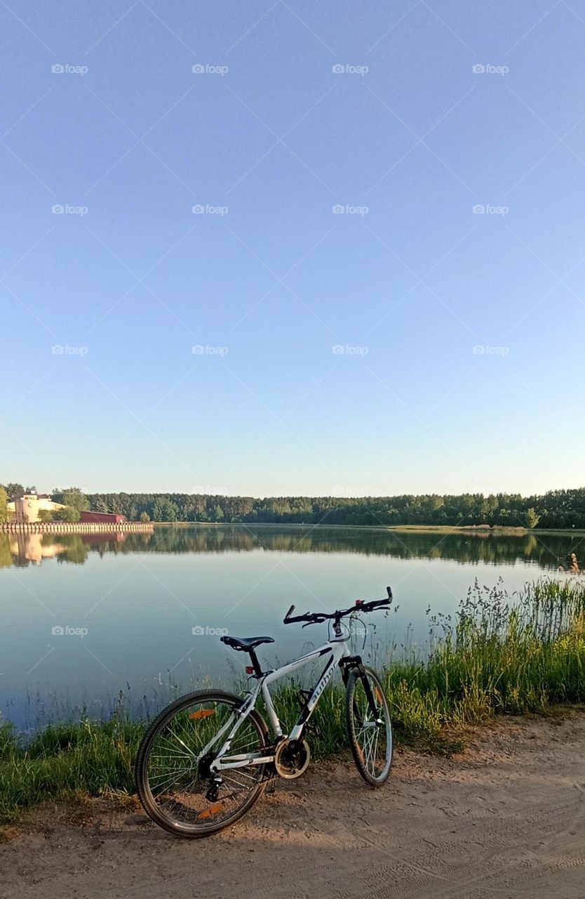 bike 🚲 on a rural road beautiful nature landscape lake shore