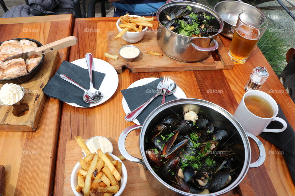 Fresh cooked mussels in a pot , bird eye view 