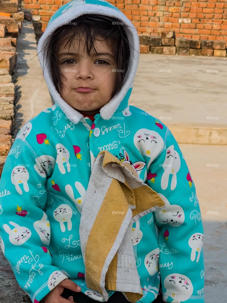 Cute little girl making very cute faces