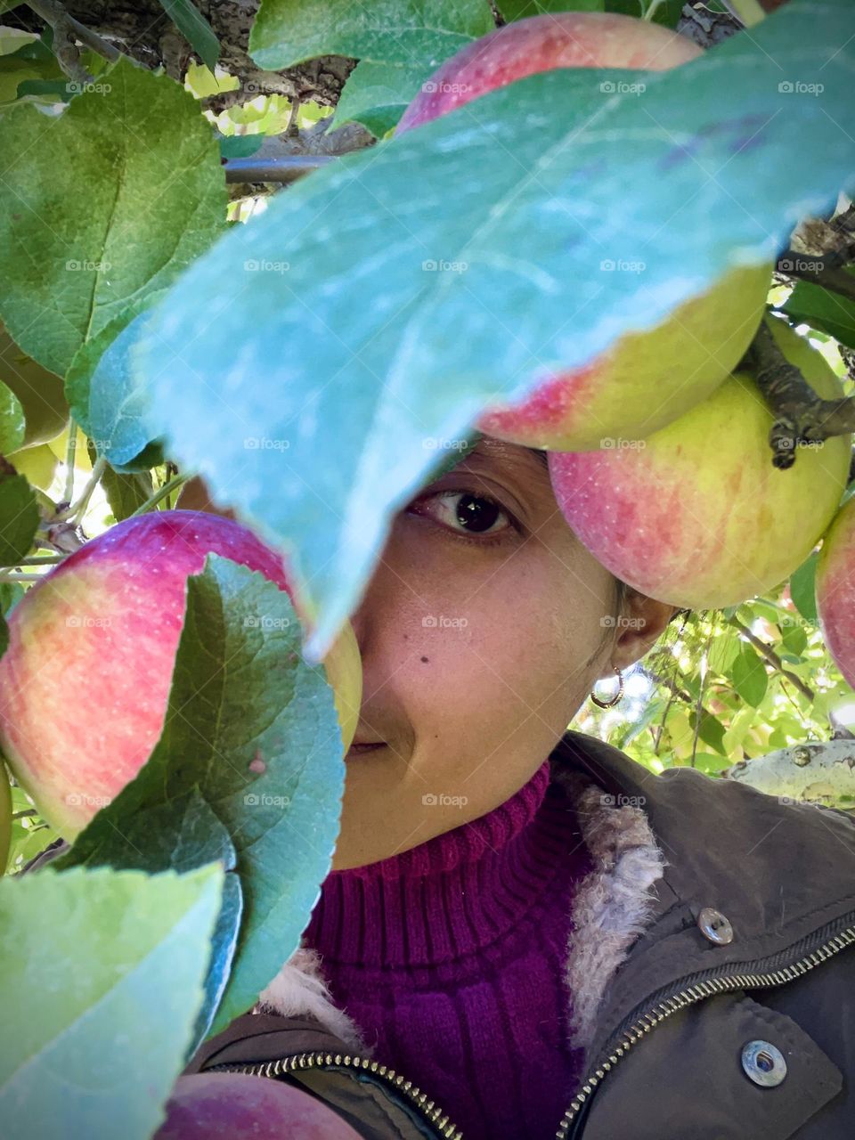 A woman under the Apple tree
