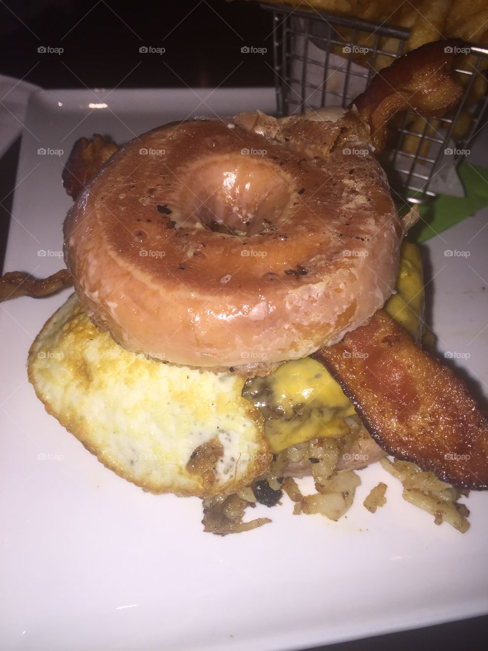 Glazed doughnut burger with eggs, bacon, and cheese!