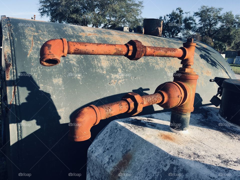 Rusty red metal pipes