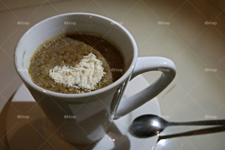 coffee with milk and oatmeal shot photo