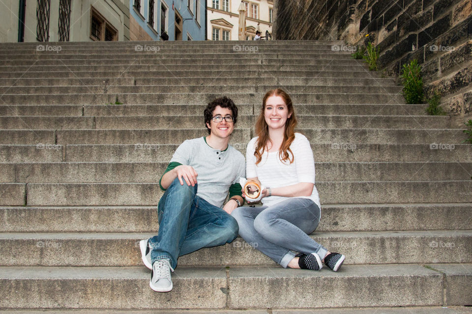 Couple sitting on the steps