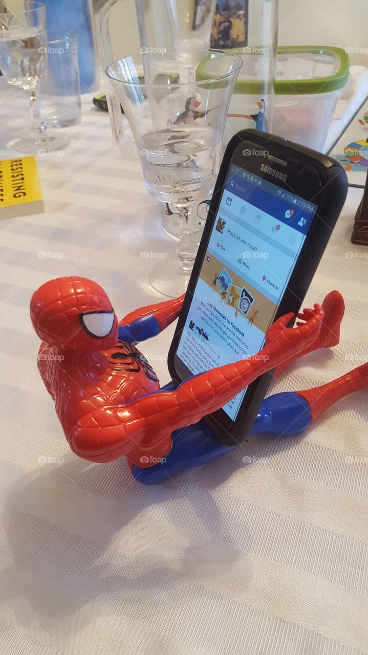 Spider-Man rocking Facebook