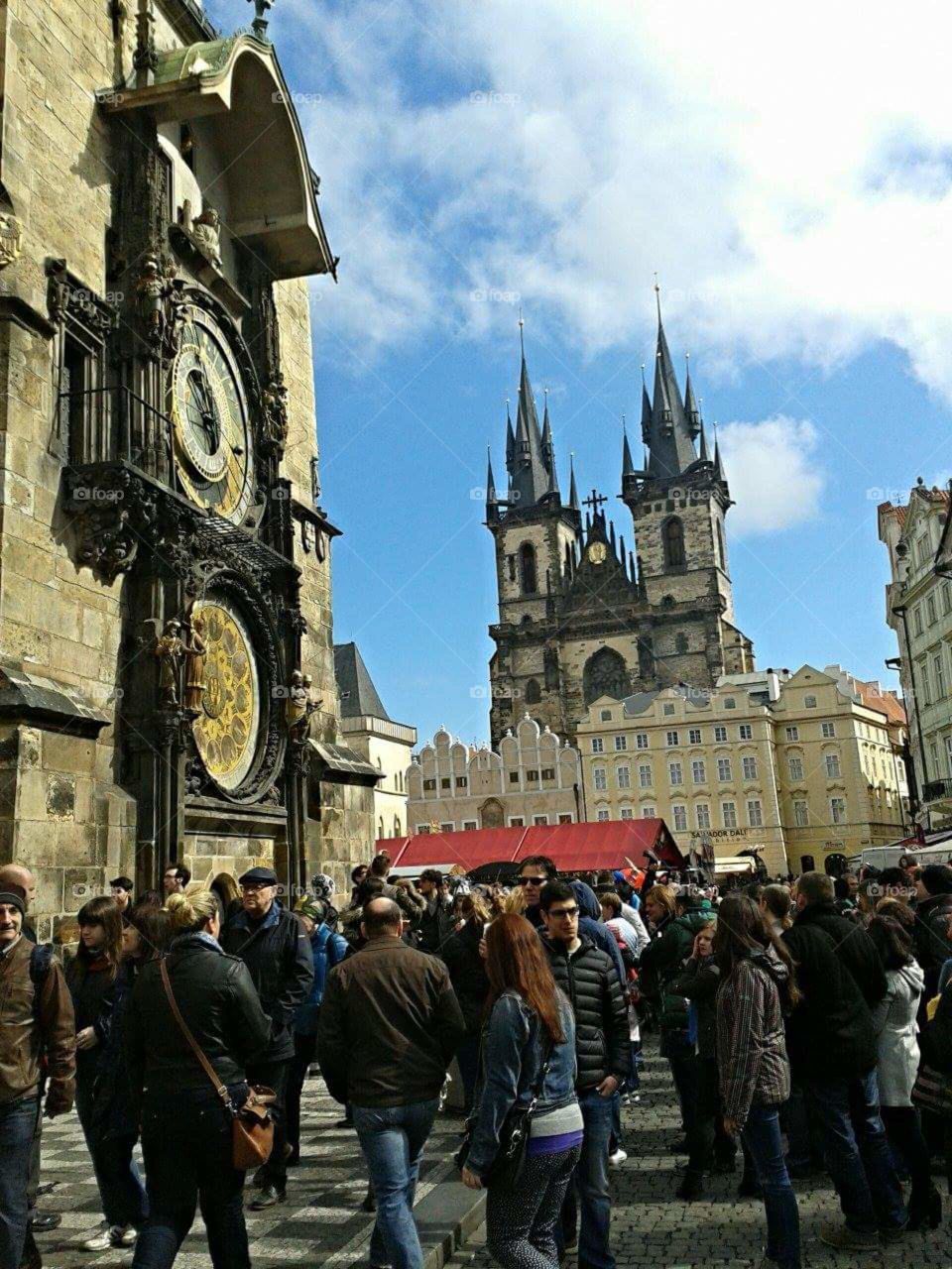 it's so interesting to watch the huge amount of tourists flock to see this old clock