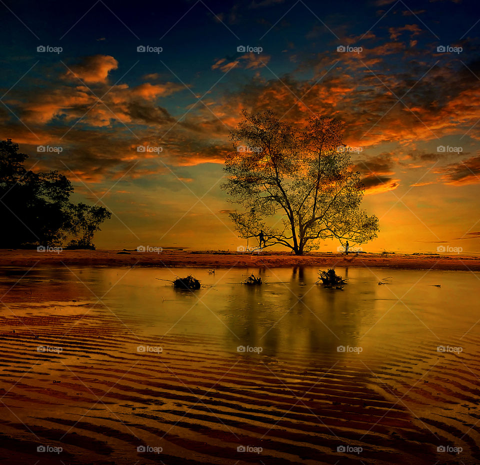 sunset at tanjung beach