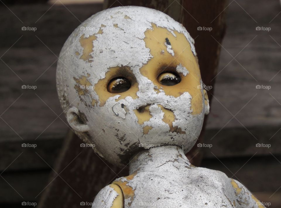 Old painted doll head. Old painted doll head