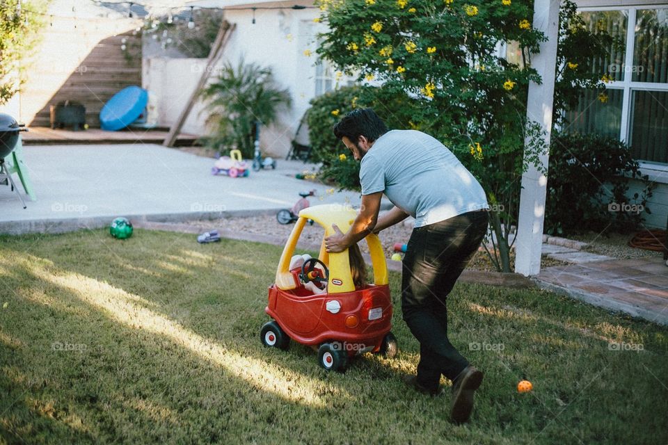 "Push me in the red car dad!"