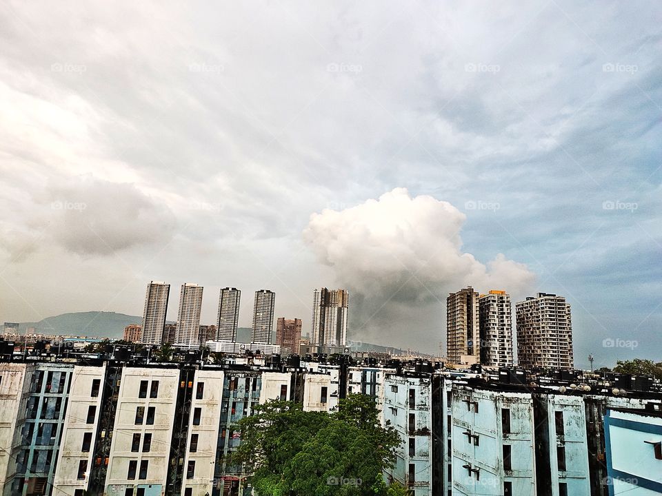 Rare Phenomenon
Rainy Season
Green Velly

Clouds 💧🌨️Trying to Rest on Mountain
Between Two Multistory Building
Rainy Season⛱️⛱️⛱️
🏢🏢🏢🏢 Buildingsill