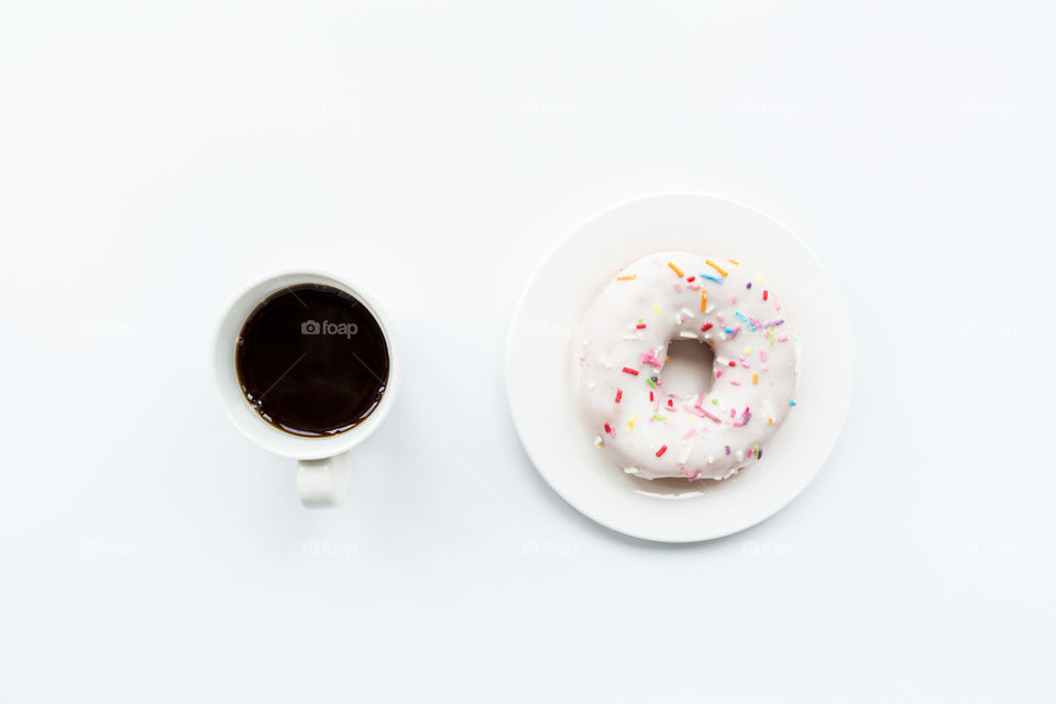 Cup of coffee and donut 