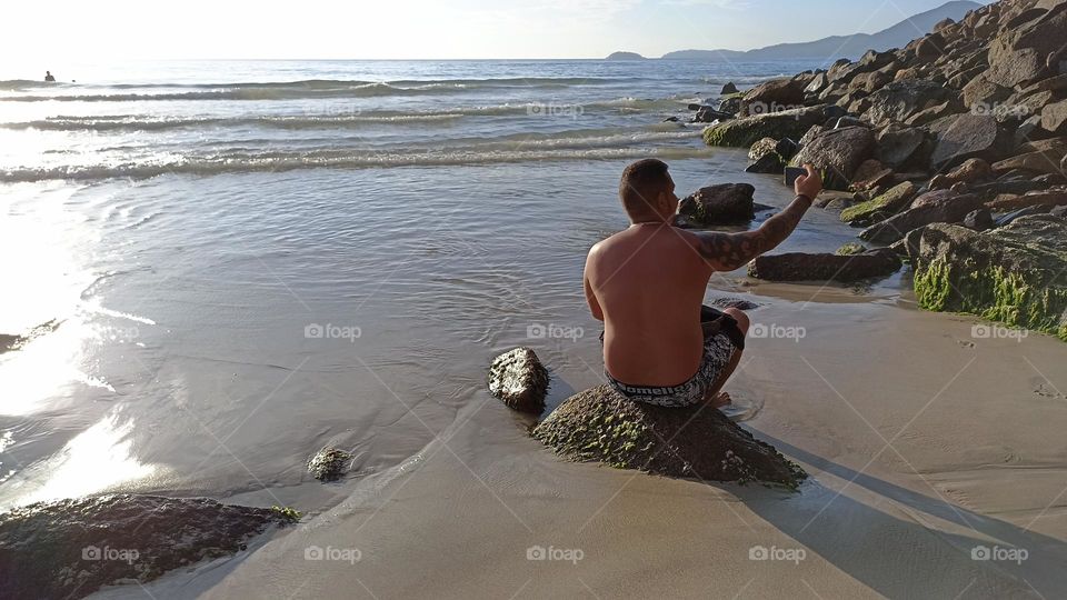 Lonely man on the beach