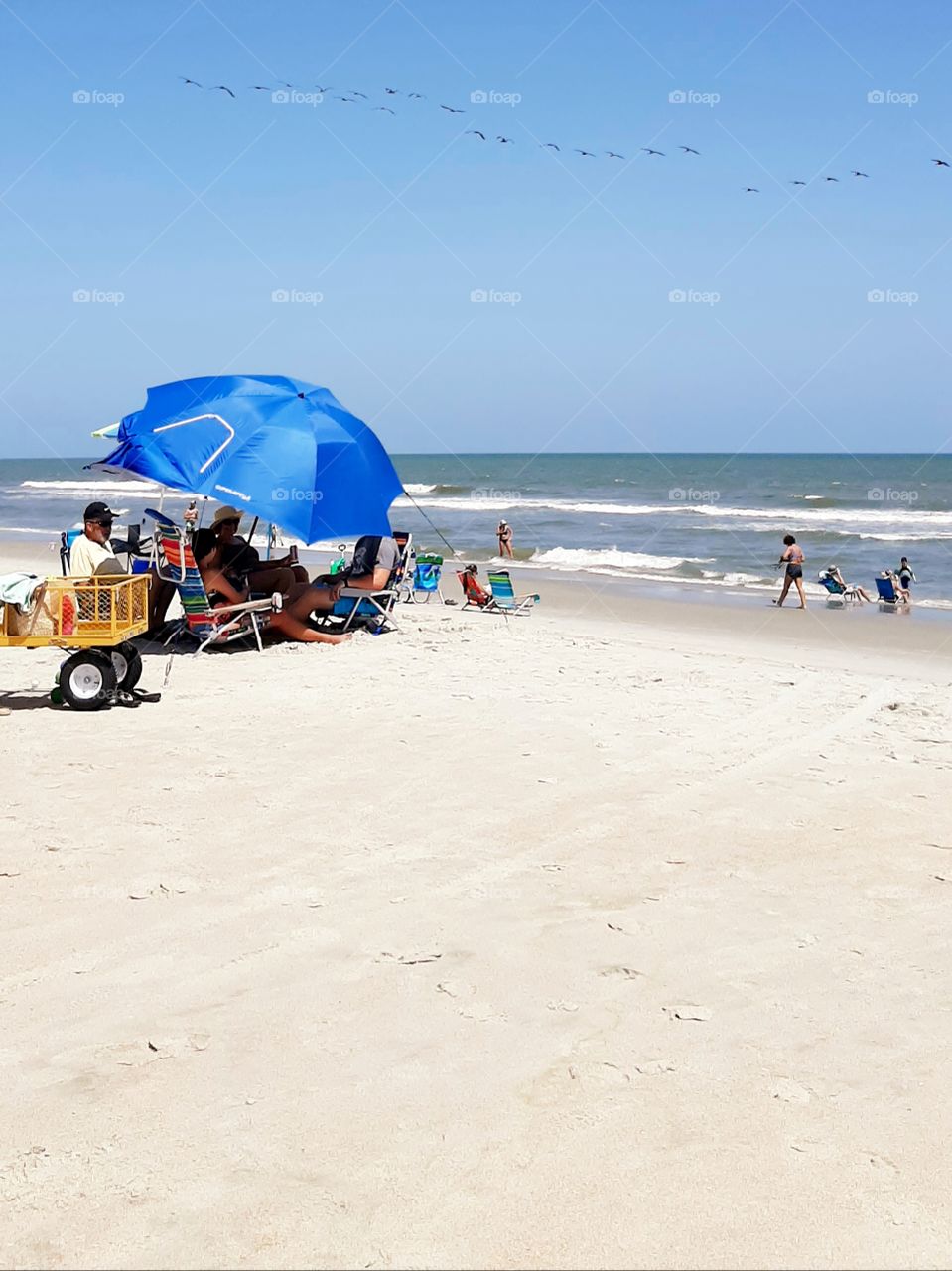 looks like this family came to take in the whole day before the rains set in. just a beautiful beach day