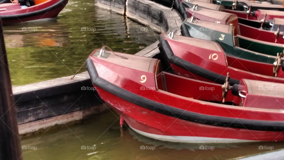 little red boats at the river, Florence, Italu