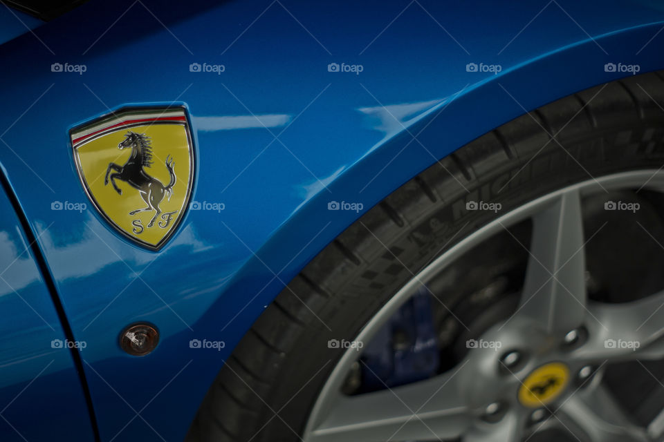 close up logo symbol Ferrari 488 spider blue coupe sports car, 3.9 liter V8 twin turbocharged produced by the Italian sports car - Ferrari F154CB V8