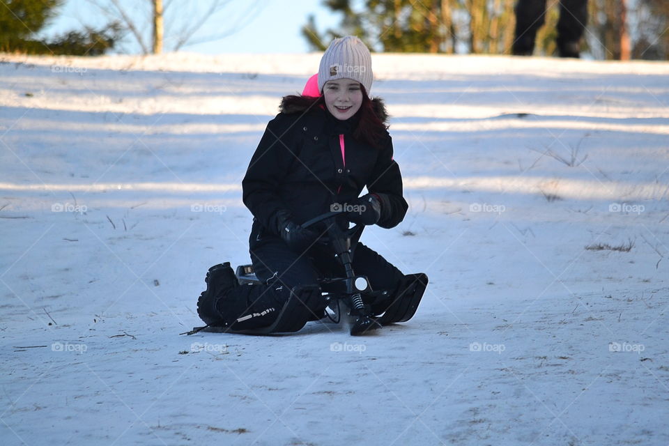 Sledding down the hill